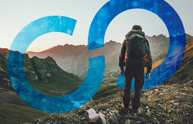 Backpacker hiking in mountain range