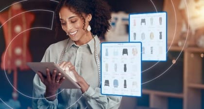 Woman Using Tablet for Fashion Inventory Research and Management